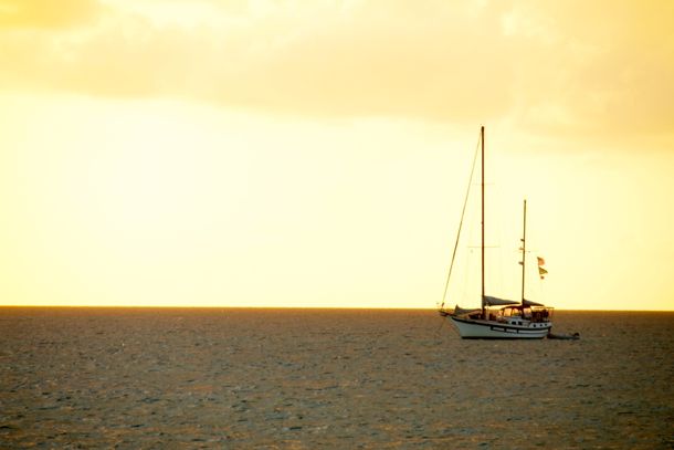 Sailboat against a blazing sky