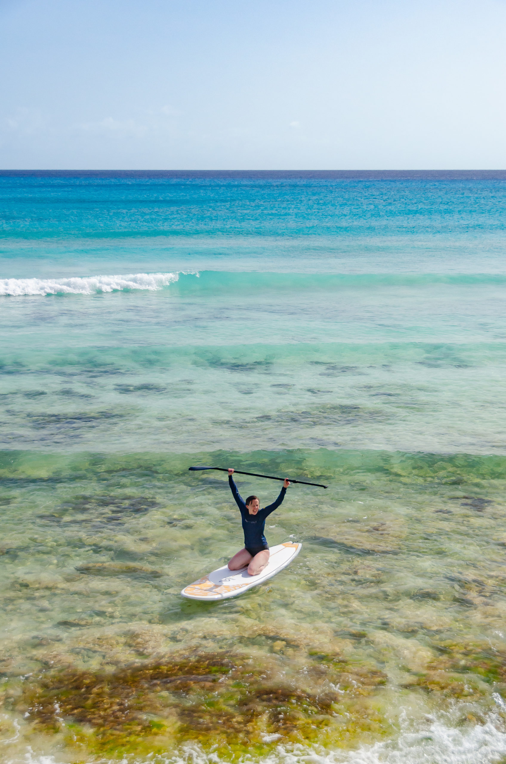 Another victorious stand up paddle boarder