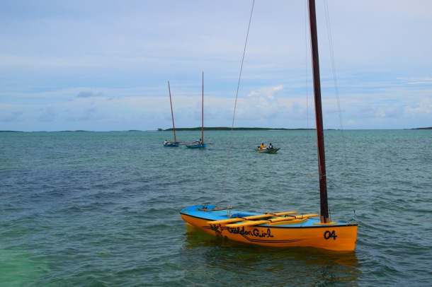 Golden Girl waits as two other sloops are tugged into position