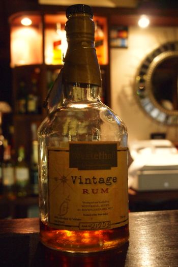 My Smiling Bottle of Vintage Rum at Le Phare Bleu, Grenada | SBPR