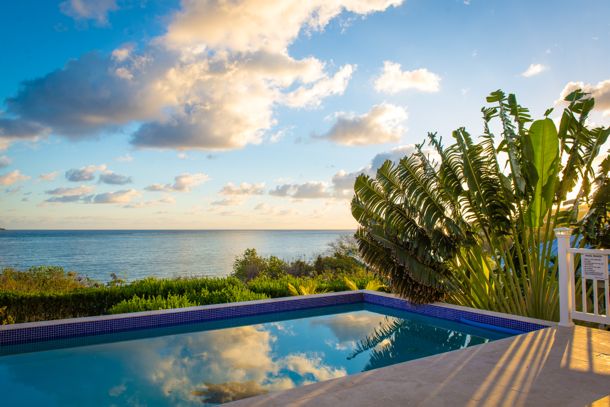 Dawn breaks over Solitude House, St. Croix by Patrick Bennett