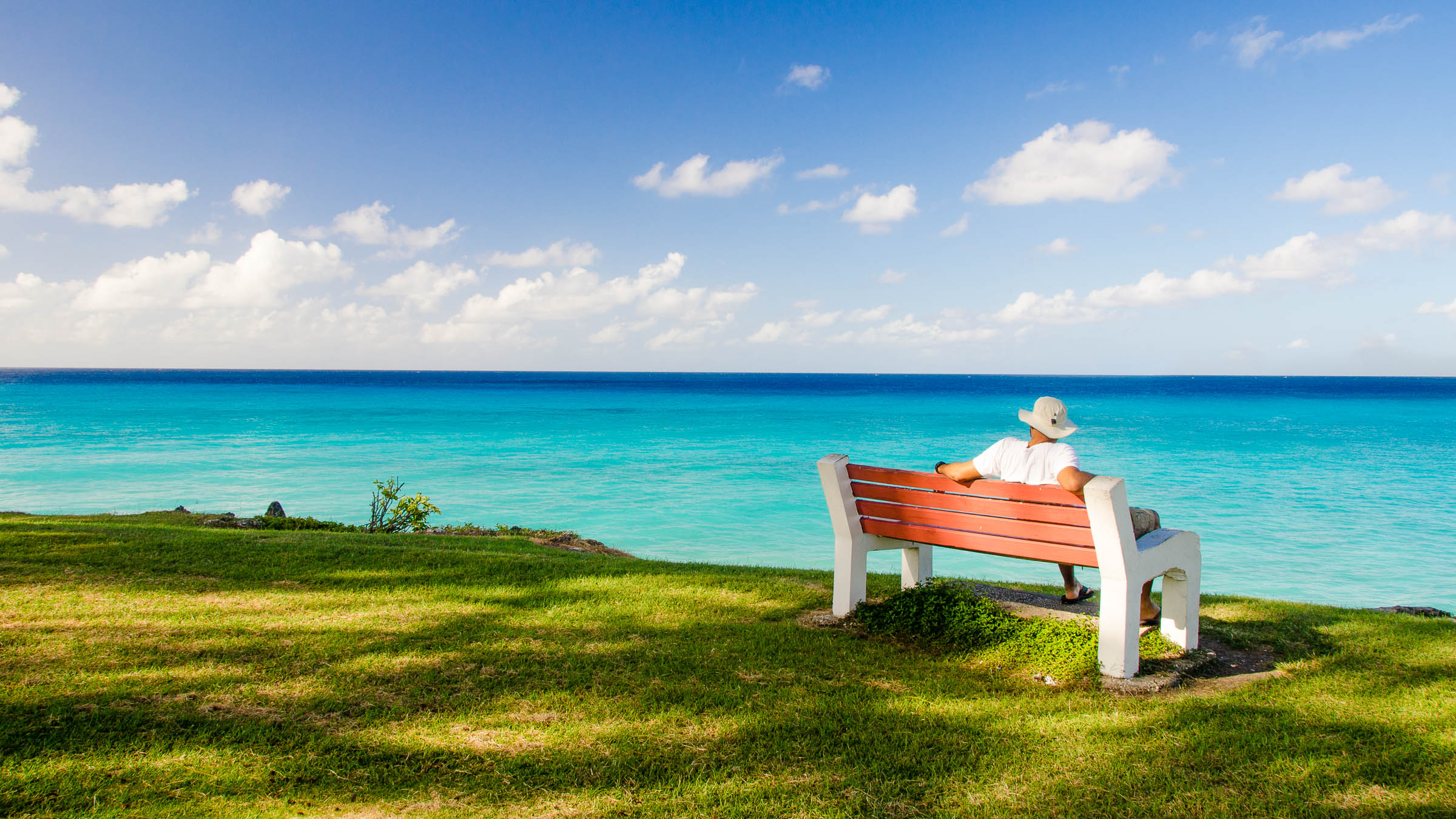 Sitting near Miami Beach, Barbados by Patrick Bennett