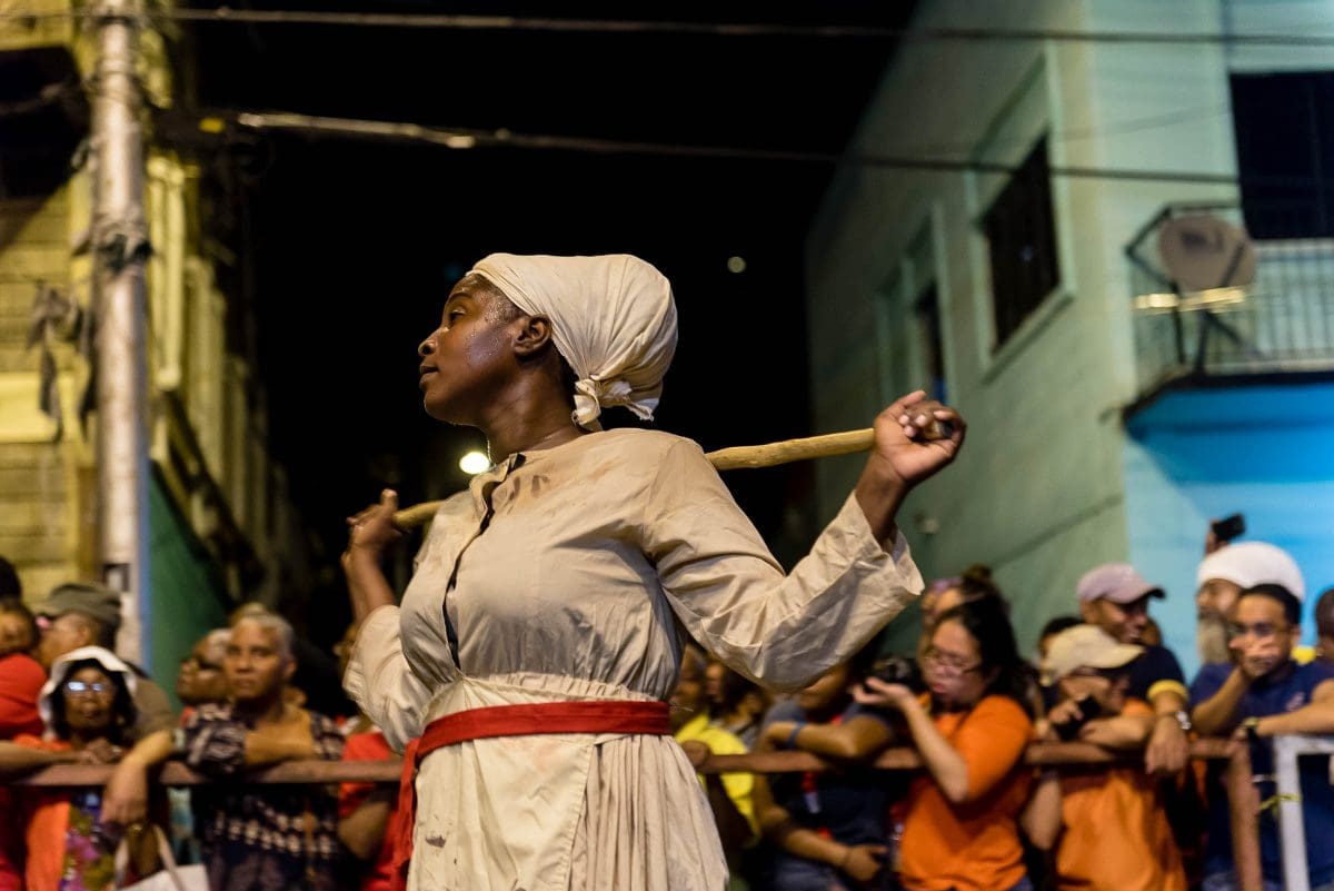 Kambule/Canboulay woman stick fighter by Patrick Bennett