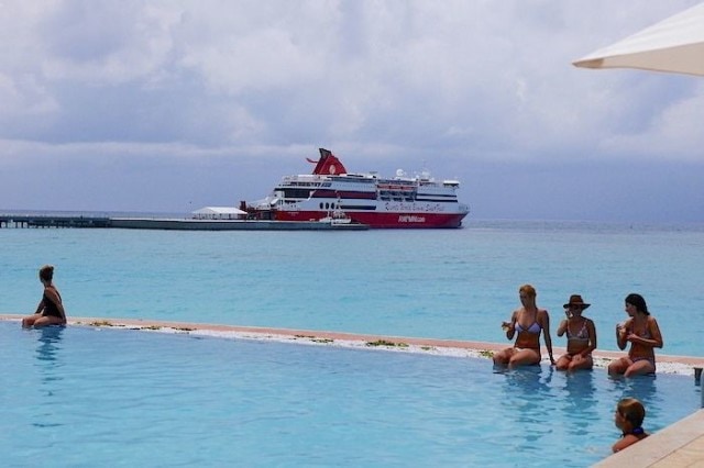 By the pool in the shadow of the Bimini Superfast | Credit: Zickie Allgrove