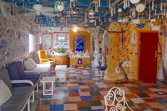 An explosion of color and kitsch inside Dolphin House, North Bimini | Credit: Zickie Allgrove