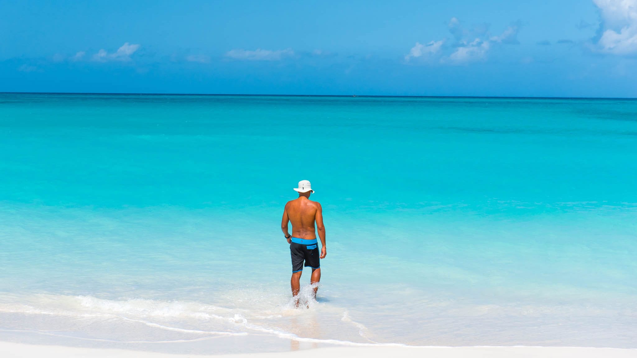 Walking in the Waves, Providenciales, TCI by Patrick Bennett