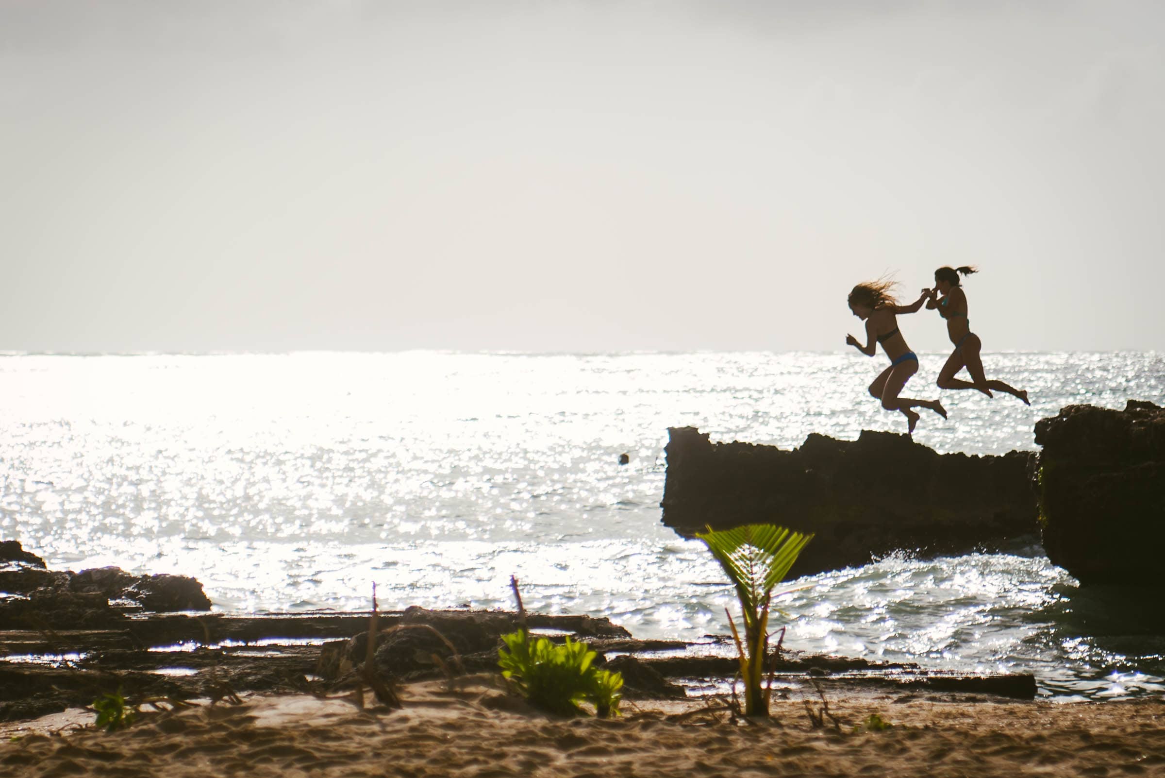 Beach Girls Jumping, Grand Cayman by Patrick Bennett