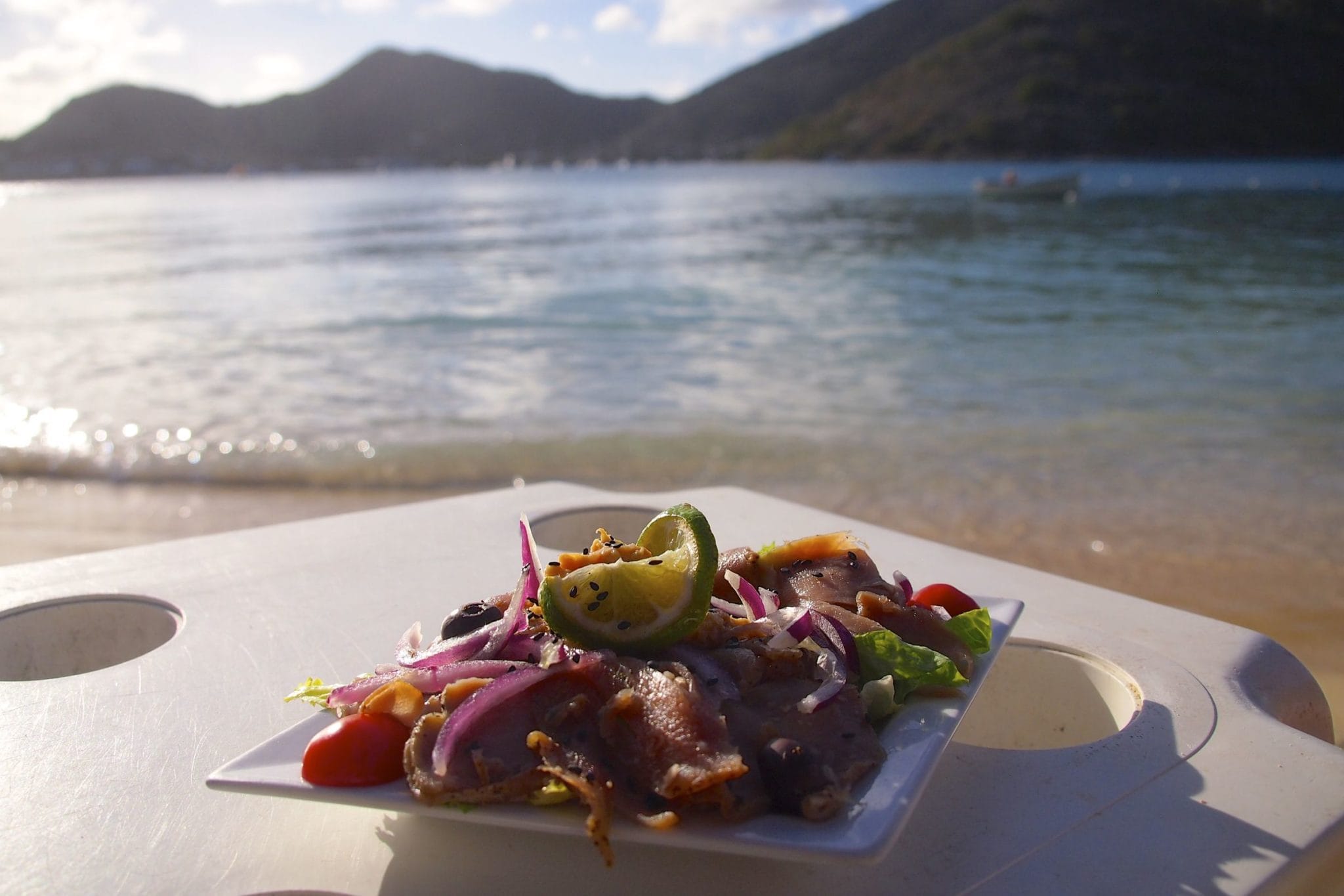 Karabuni Smoked Salmon on the shores of Pinel Island, St. Martin | SBPR