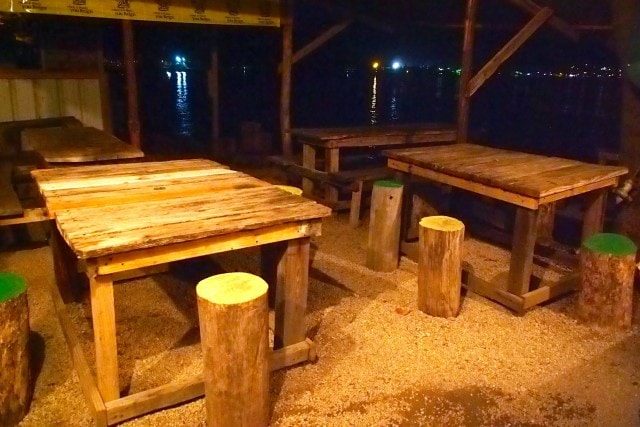 Rustic tables, stools at Monty's Fish Grill and Bar, Dominica | SBPR