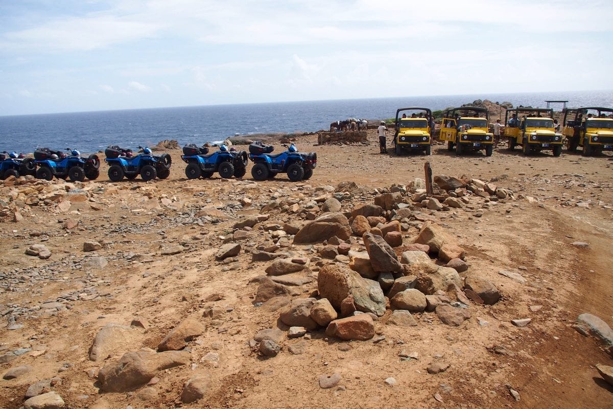 Crowded parking lot at Conchi Natural Pool, Aruba