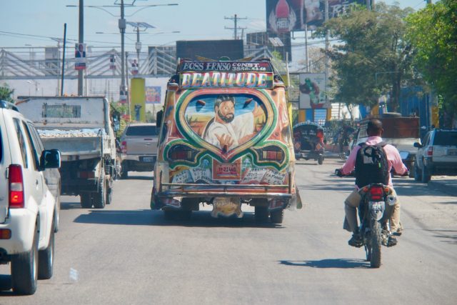 Tap-Tap gliding through "light" traffic in Port-au-Prince, Haiti | SBPR