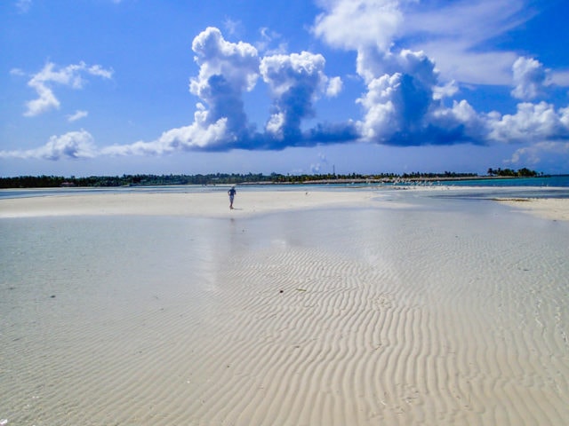 Chasing clouds across a sandbar in Bimini. The Bahamas