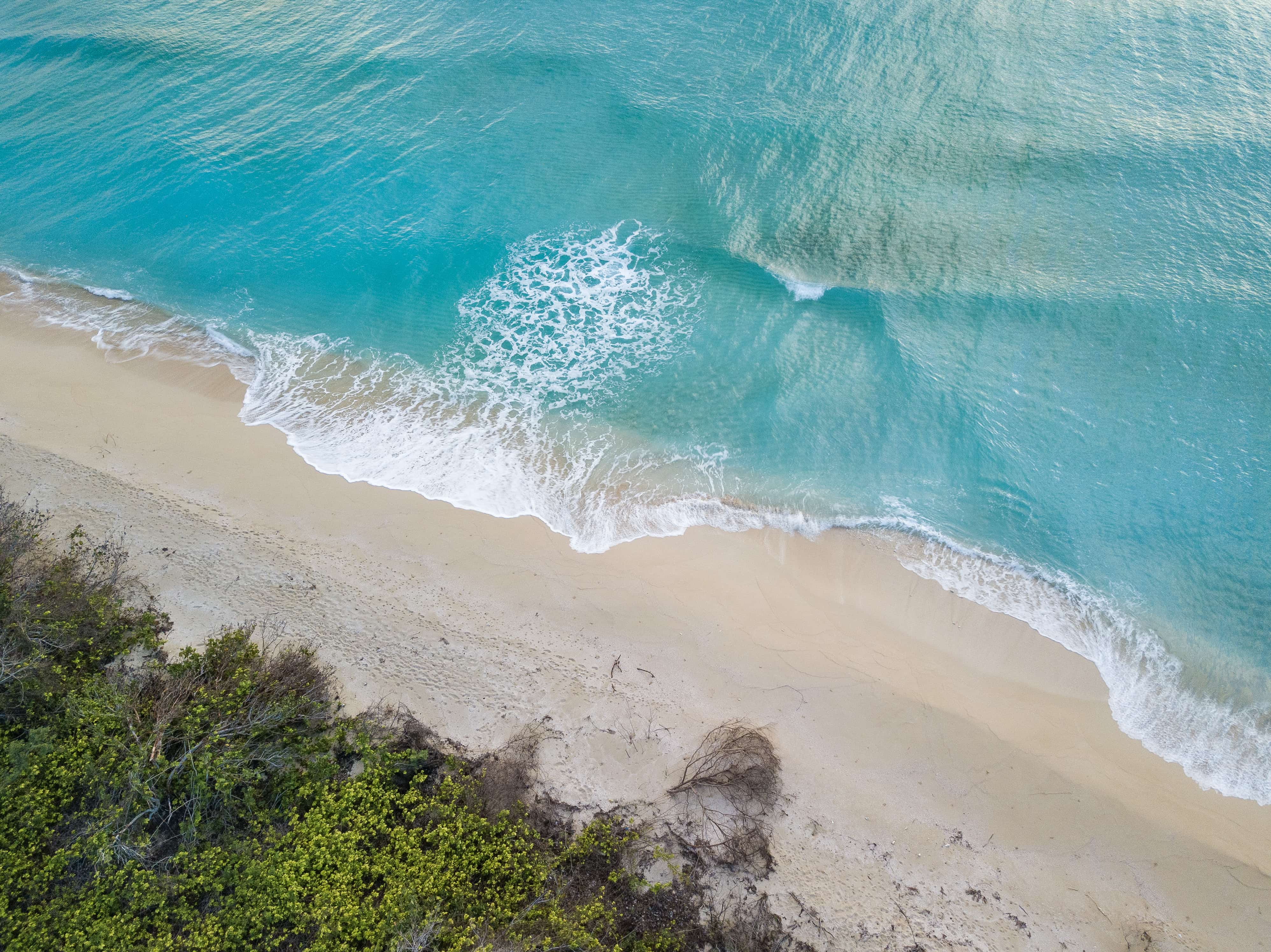 High over Sandy Point, St. Croix | Credit: Patrick Bennett