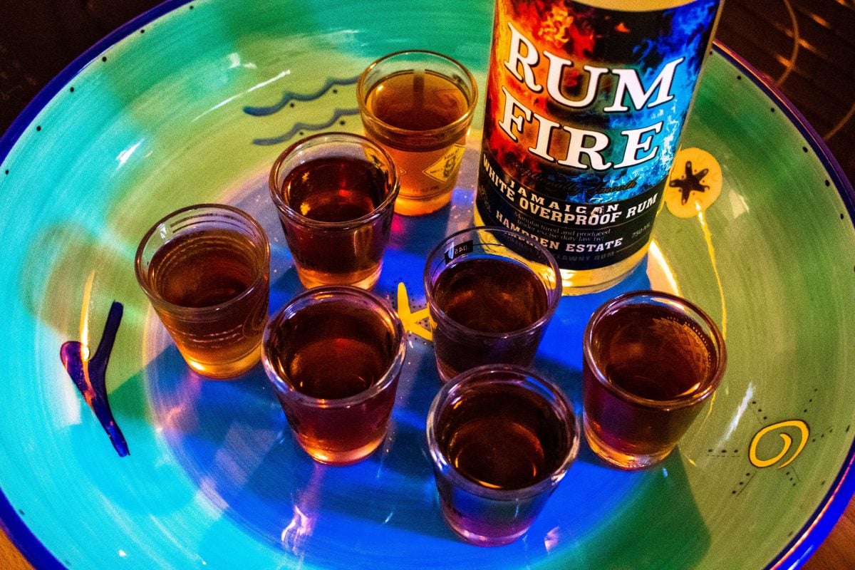 Add Some Serious Jamaican Heat To Your Happy Hour With a Rum Fire Cafe