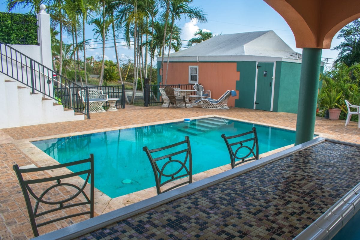 View of the pool from behind the bar at Arawak Bay, St. Croix | SBPR