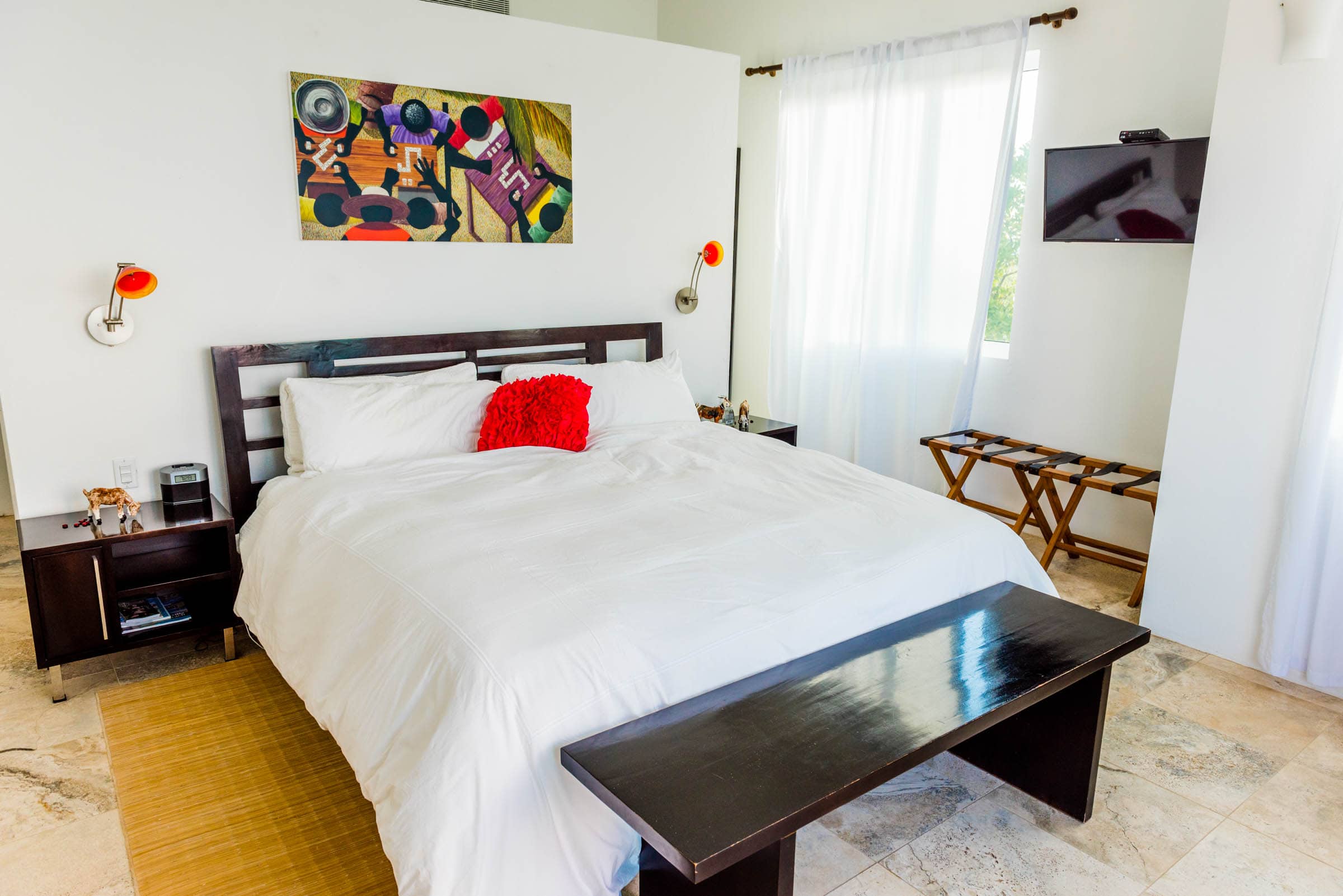 Each of the three bedrooms are bright, well-appointed, and feature views of St. Martin.