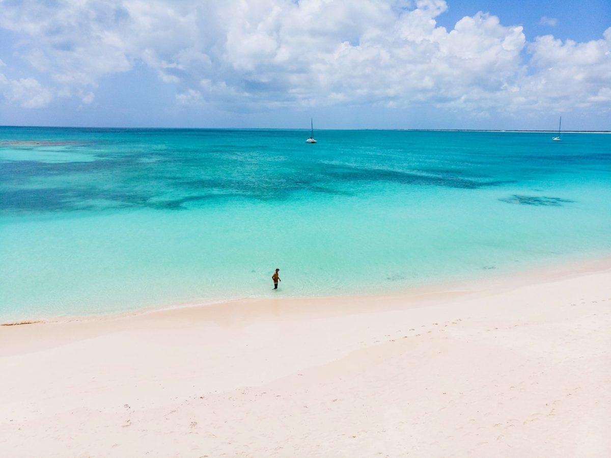 Wading along Princess Diana Beach at Cocoa Point, Barbuda | Credit: Patrick Bennett