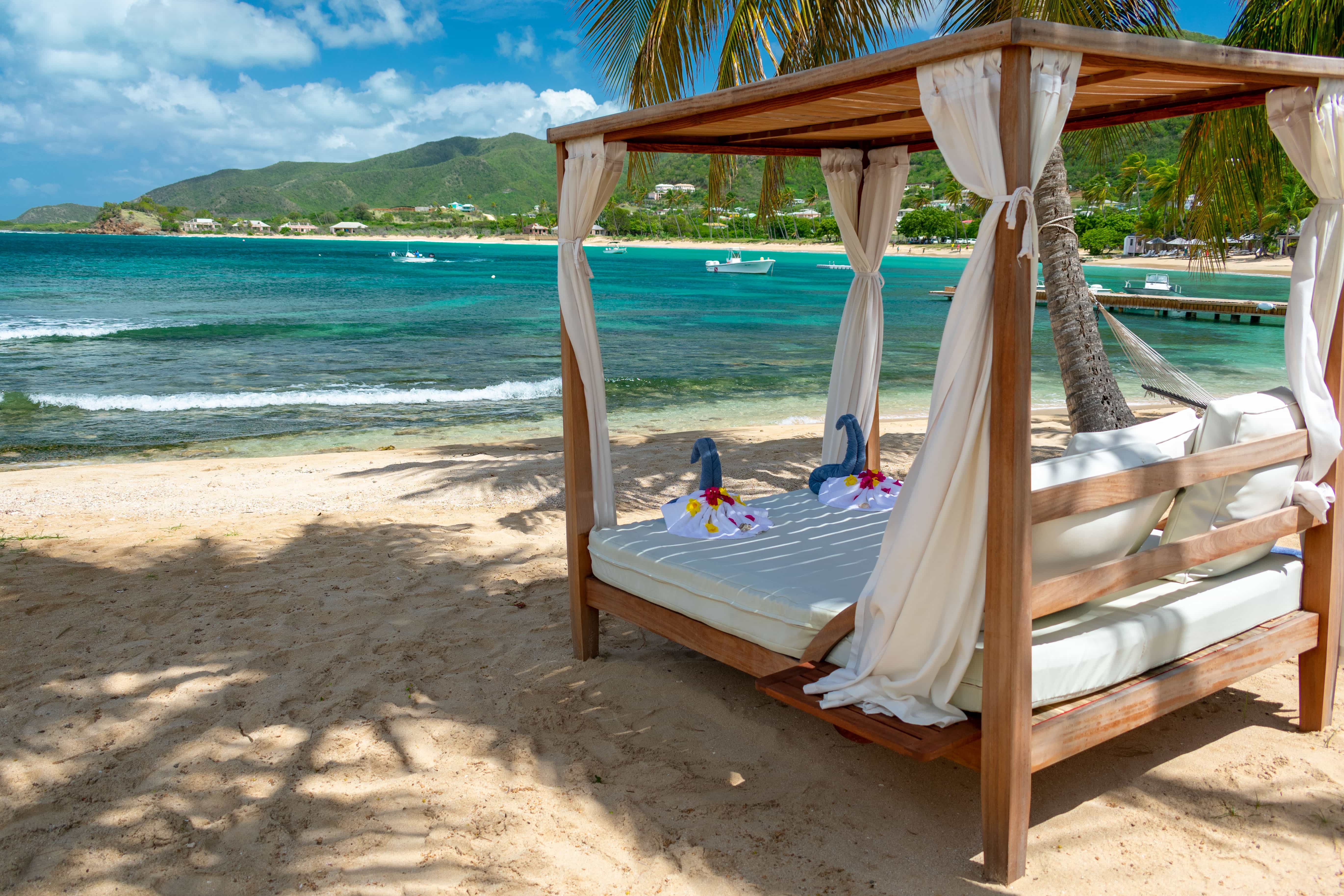 Bed by the sea at Curtain Bluff, Antigua
