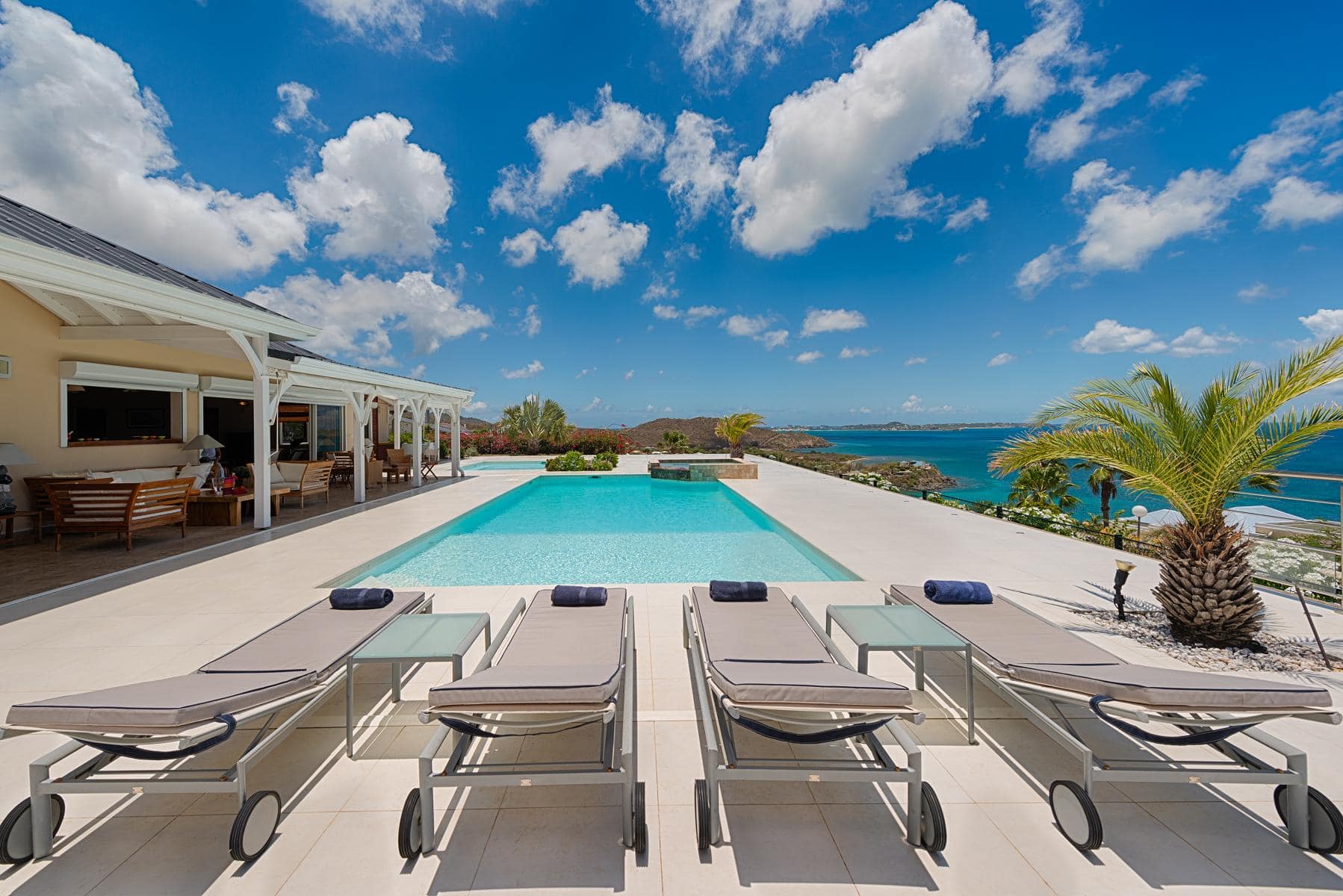 Luxury Villas in St. Martin – Dreamin Blue | Credit" 100% Villas