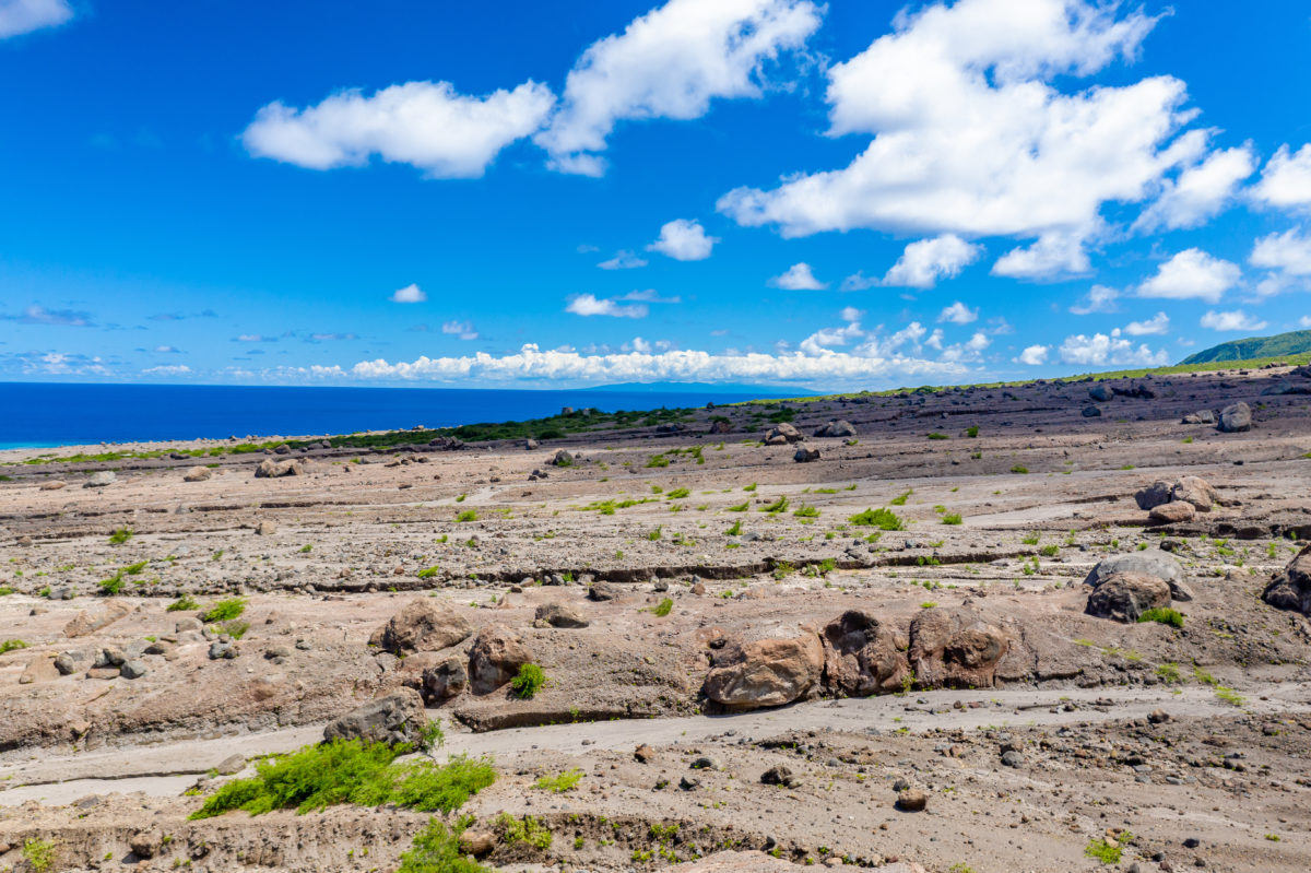 Beneath these rocks and dirt are the remains of roads and an airport