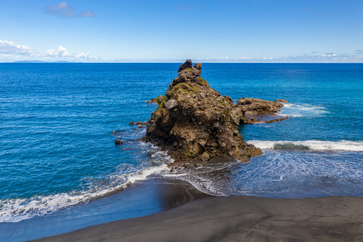 Volcanic rock formations dot the landscape