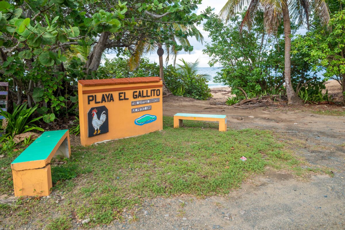 Playa El Gallito sign